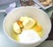 Eggs, butter and sugar in mixing bowl.