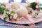 Eggs, Easter decoration, apple tree flowers on a wooden surface