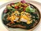 Eggs Florentine- Toasted Bread, Poached Eggs, Spinach and Delicious Buttery Hollandaise sauce with Salad and Green Olive Slices
