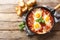 Eggs in Purgatory is a delicious Southern Italian dish consisting of fried eggs in a spicy tomato sauce with onions and garlic