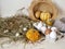 Eggs and quail eggs in a package, pumpkins , hay, Easter concept, preparation for the holiday, harvest, seasonal holidays