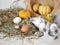 Eggs and quail eggs in a package, pumpkins , hay, Easter concept, preparation for the holiday, harvest, seasonal holidays