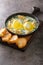 Eggs Sardou is a Louisiana Creole cuisine dish made with poached eggs, artichoke bottoms, creamed spinach and Hollandaise sauce