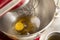 Eggs and sugar in a metal blender bowl