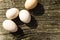 Eggs on a wooden background in sunlight, chicken eggs.