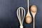 Eggs, wooden spoon and whisker