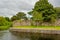 Eglinton Canal  a stone wall and green vegetation in the Millennium Children\'s Park