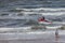 Egmond aan Zee, Netherlands - July 18, 2019: a member of the dutch coastguard  on a jet ski in the north sea