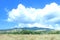 Egon mountain with blue sky and thatch.