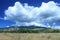 Egon mountain with blue sky and thatch.