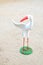 Egret model standing on the sand