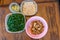 Egusi seed, spinach, seasoning cubes and dried fish to prepare Nigerian Soup