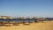 Egypt, Empty Sunny Beach with Umbrellas, Sun Beds on the Red Sea
