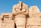 EGYPT, LUXOR - MARCH 01, 2019: ancient sandstone statues, Karnak Temple, Hall of caryatids. Luxor, Egypt