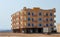 EGYPT, MARSA ALAM-FEBRUARY 24, 2019: typical modern Egyptian stone house in small settlements near the road