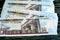 Egypt money stack of pounds  on wood background, pile of 50 EGP LE fifty Egyptian pounds cash money bills with a image of