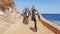 Egypt, Sharm El Sheikh - June 10, 2019: divers with snorkeling equipment go into the sea through the sky with clouds in Egypt