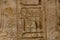 Egyptian ancient hieroglyphs on the stone wall. Closeup of the symbol of eternal life ankh