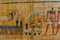 Egyptian ancient papyrus with the different pictures and hieroglyphics