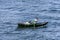 An Egyptian boy rows a boat across the River Nile in Egypt.