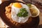 Egyptian breakfast: beans with a fried egg close-up. horizontal