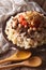 Egyptian Cuisine: kushari close-up on the plate. Vertical