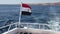 Egyptian flag on the white yacht sway on the wind