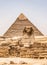 Egyptian Great Sphinx full body portrait head,with pyramids of Giza background Egypt empty with nobody. copy space