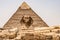 Egyptian Great Sphinx full body portrait head,with pyramids of Giza background Egypt empty with nobody. copy space