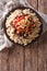 Egyptian kushari of rice, pasta, chickpeas and lentils Vertical