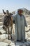 An Egyptian man and his donkey at Saqqara in Egypt.