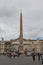 An Egyptian obelisk of Ramesses II from Heliopolis stands in the centre of the Piazza