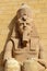Egyptian sculpture of a sitting man