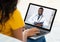 Ehealth. Unrecognizable woman having online video conference with doctor on webcam, using laptop to chat with GP