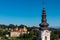 Ehrenhausen - Panoramic aerial view of Ehrenhausen town with the clock tower of the Catholic pilgrimage church