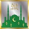 Eid-al-Fitr greeting card with silver mosque and gold lanterns