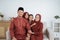 Eid Mubarak concept,asian family wearing Malay traditional clothes