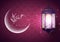 Eid Mubarak greeting card with crescent and hanging arabic lantern