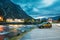 Eidfjord, Norway. Car Renault Duster SUV Parked Near Mountains River In Norwegian Village In Summer Night