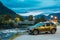 Eidfjord, Norway. Car Renault Duster SUV Parked Near Mountains River In Norwegian Village In Summer Night