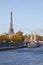 Eiffel tower and Alexander III bridge and Seine river view in a sunny day in Paris