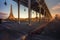 Eiffel Tower from Bir-Hakeim metal bridge at sunset in Paris