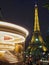 Eiffel Tower and carousel at night