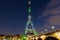 The Eiffel tower covered by a green visual forest, Paris, France