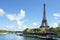 Eiffel Tower distant horizontal landscape, river seine and boats