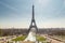 Eiffel Tower and fountain at Jardins du Trocadero at sunrise in Paris, France. Travel background