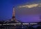 Eiffel Tower illuminated and the bridge Passerelle Debilly, view from the Seine quay in March 17, 2012 in Paris, France.