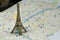 Eiffel Tower and map of Paris