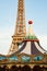 Eiffel Tower with an ornate carousel in the foreground