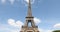 Eiffel Tower in Paris in a sunny day, frontal tilt view, blue sky in France